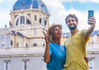 Tourist couple visiting Madrid city on summer vacation