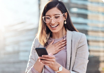 User with mobile phone looking surprised