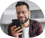 man looking at his mobile device
